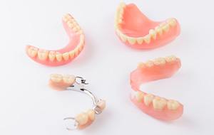 Types of dentures on a table